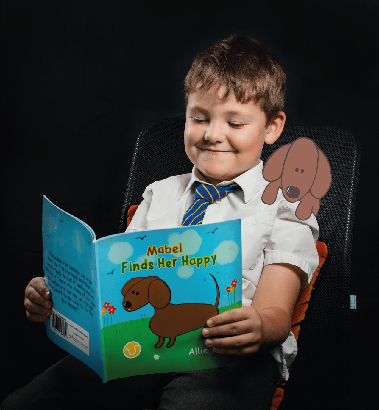 A young boy is reading a book called mabel finds her happy