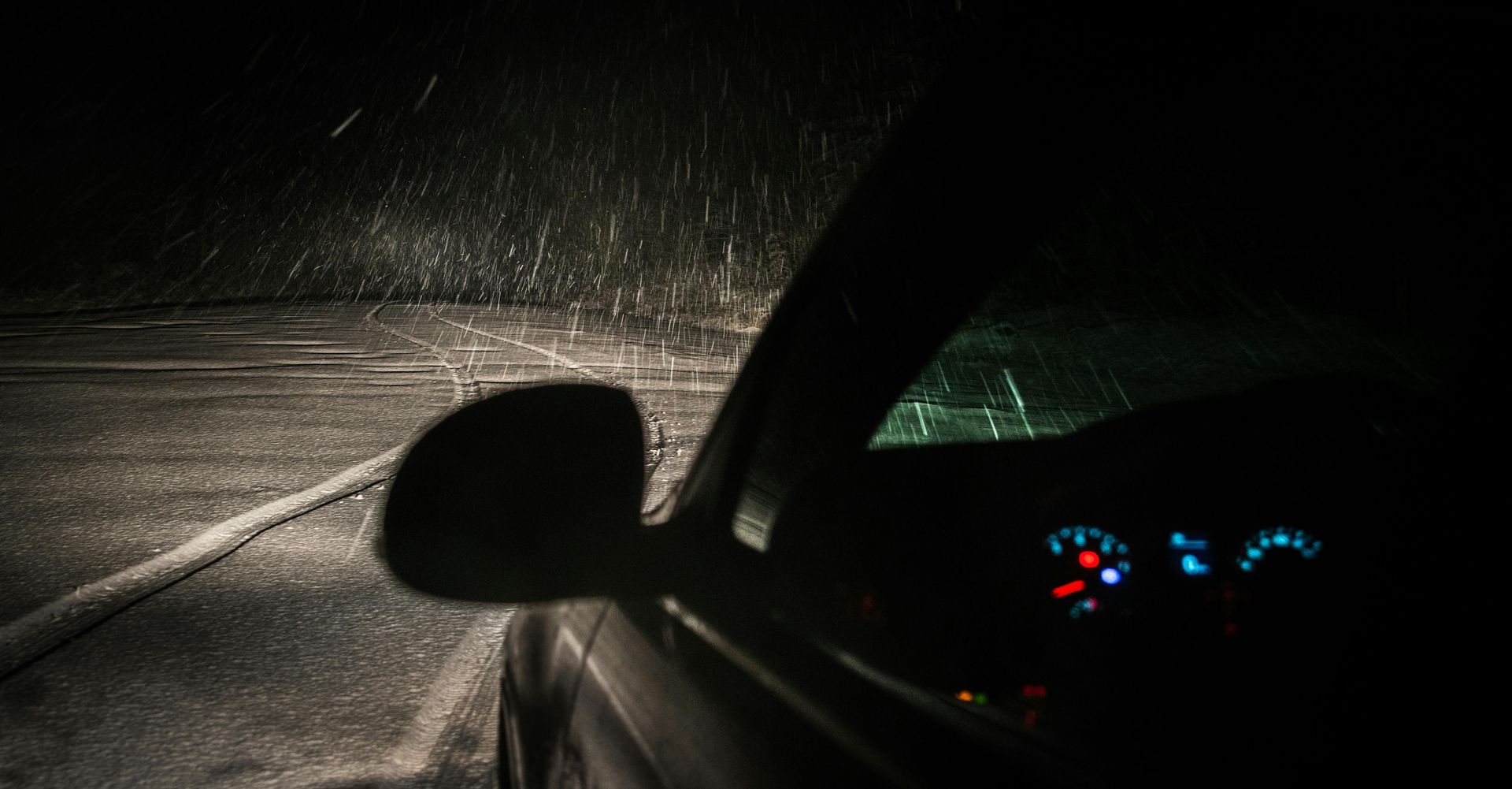 driving at night, in the rain