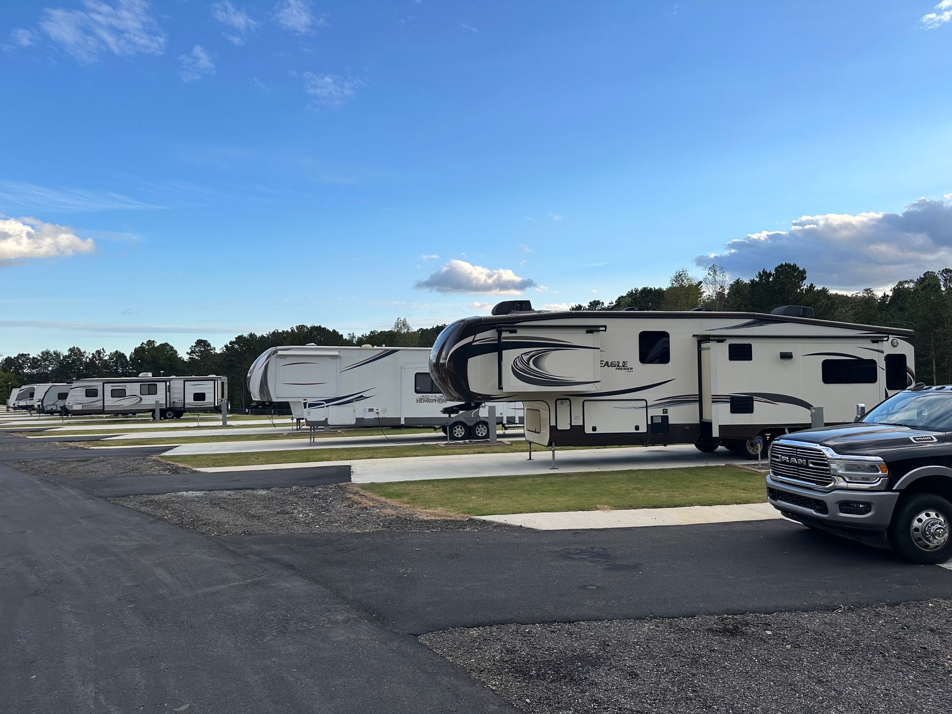 A view of a mountain range with clouds in the sky