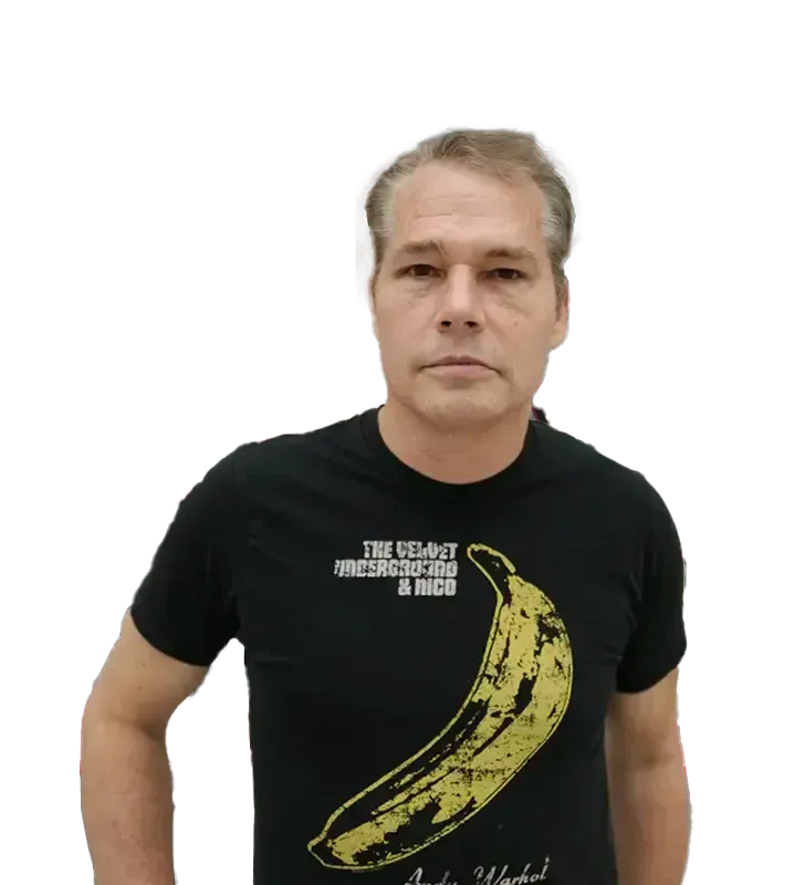 A man wearing a black shirt with a banana on it