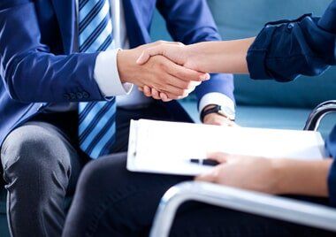 Life Insurance — Businessman Shake Hands With Client in Fresno, CA