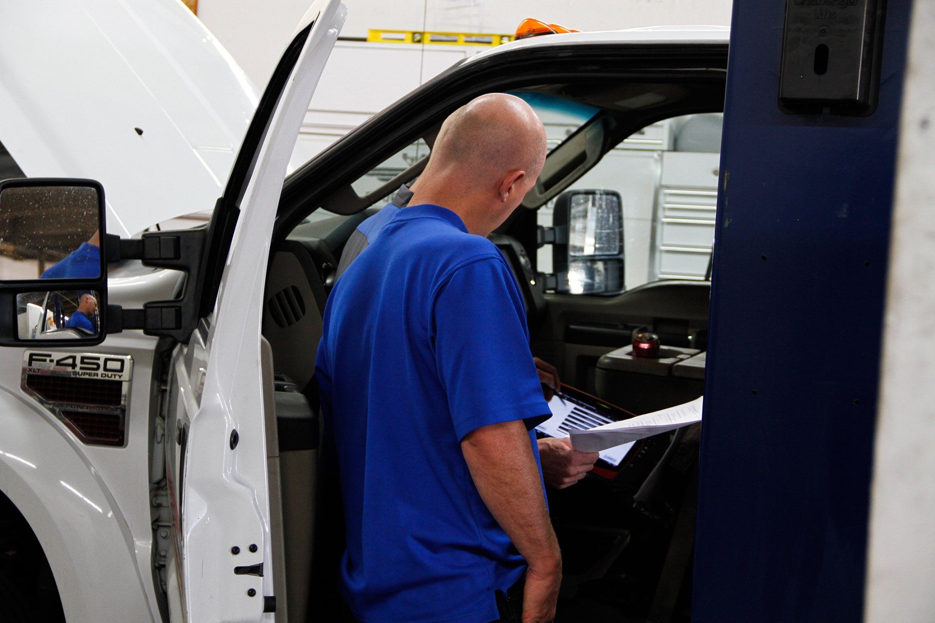Mechanics Inspecting Car Interior – Littleton, CO – Swift Automotive