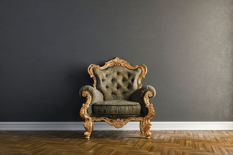 Antique Design Chair with Gray Background Wall — Fabric Showroom in Groton, CT