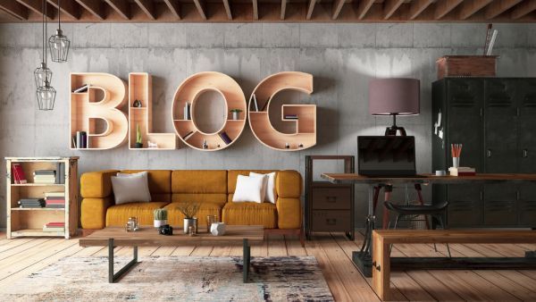 A living room with a yellow couch and the word blog on the wall