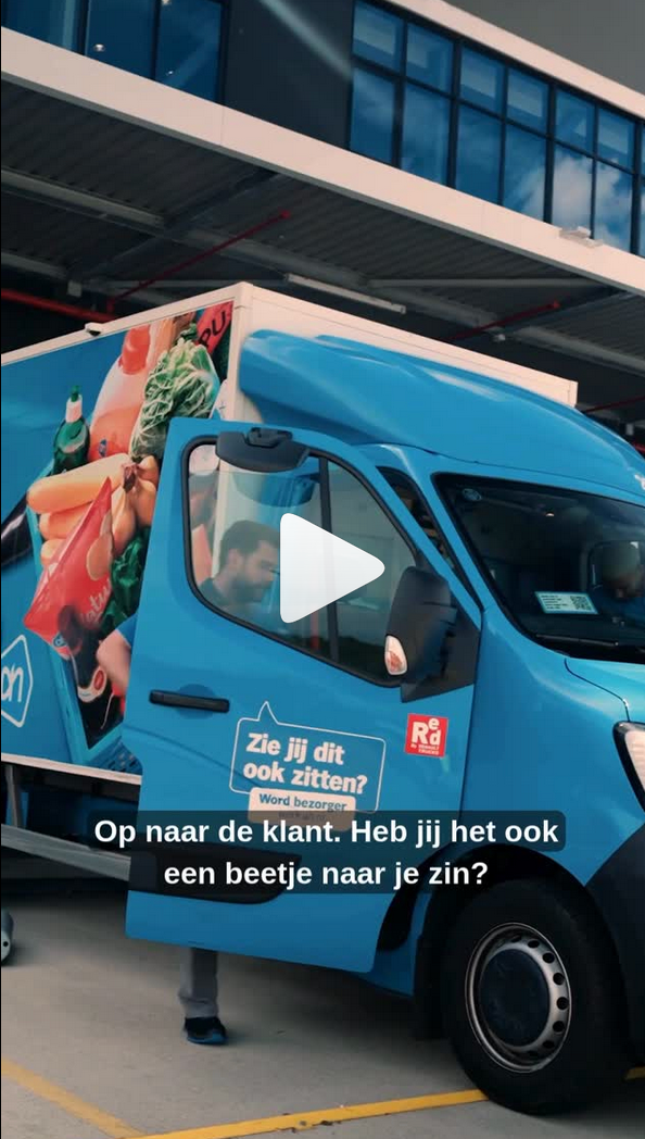 Blue delivery van with an open door. Text on the side and bottom: 