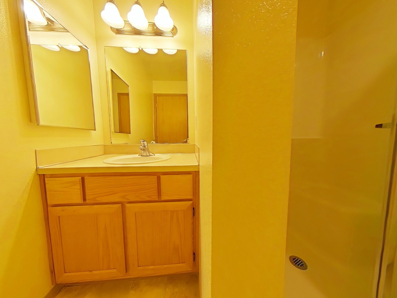 Bathroom counter with outdated countertops