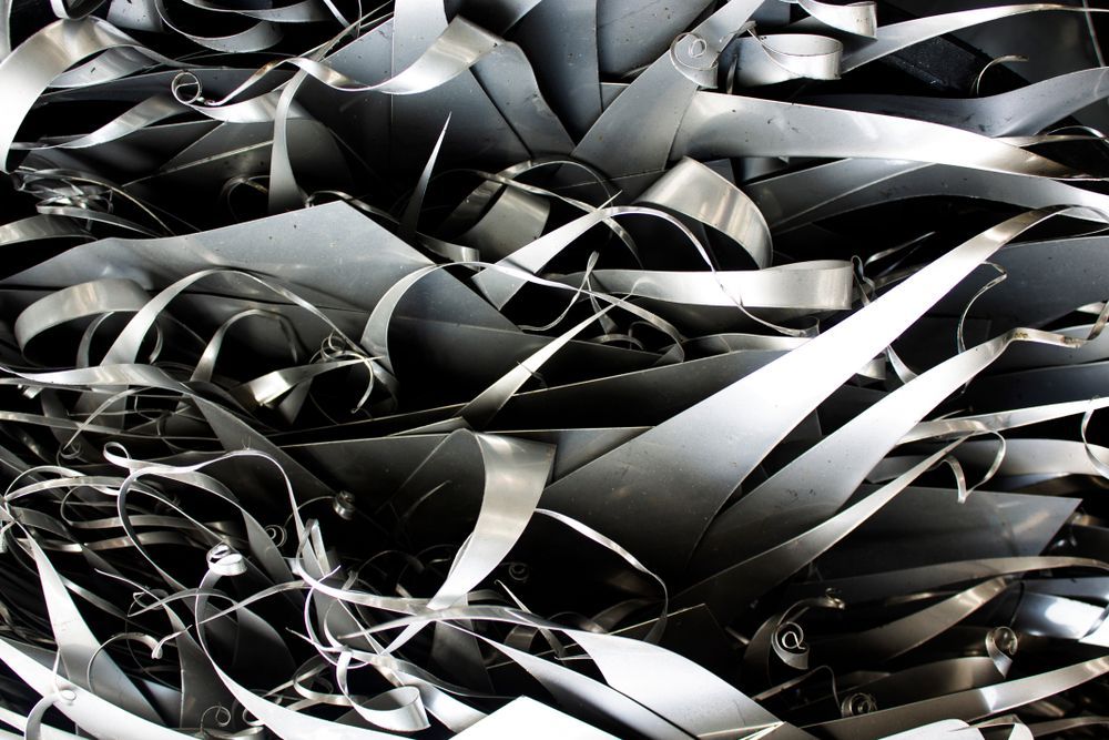 Close-up of a Pile of Shiny, Metallic Metal Shavings and Curled Ribbons — Independent Scrap Metal Pty Ltd in Maclean, NSW