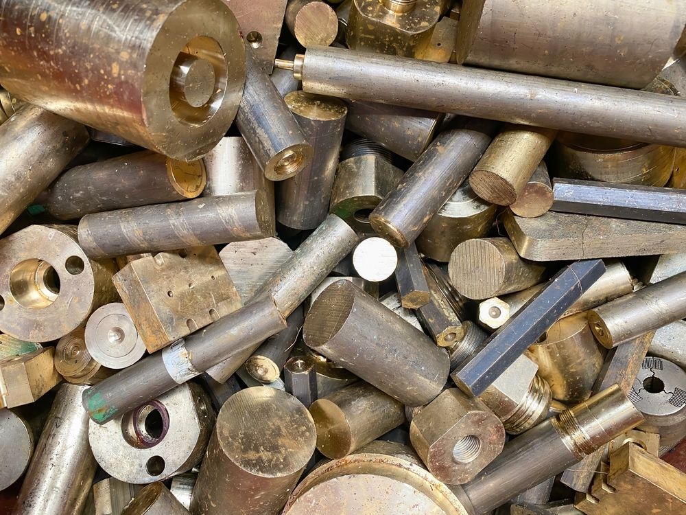 Pile of Brass Scrap Metal Pieces: Rods, Cylinders, and Blocks — Independent Scrap Metal Pty Ltd in Murwillumbah, NSW