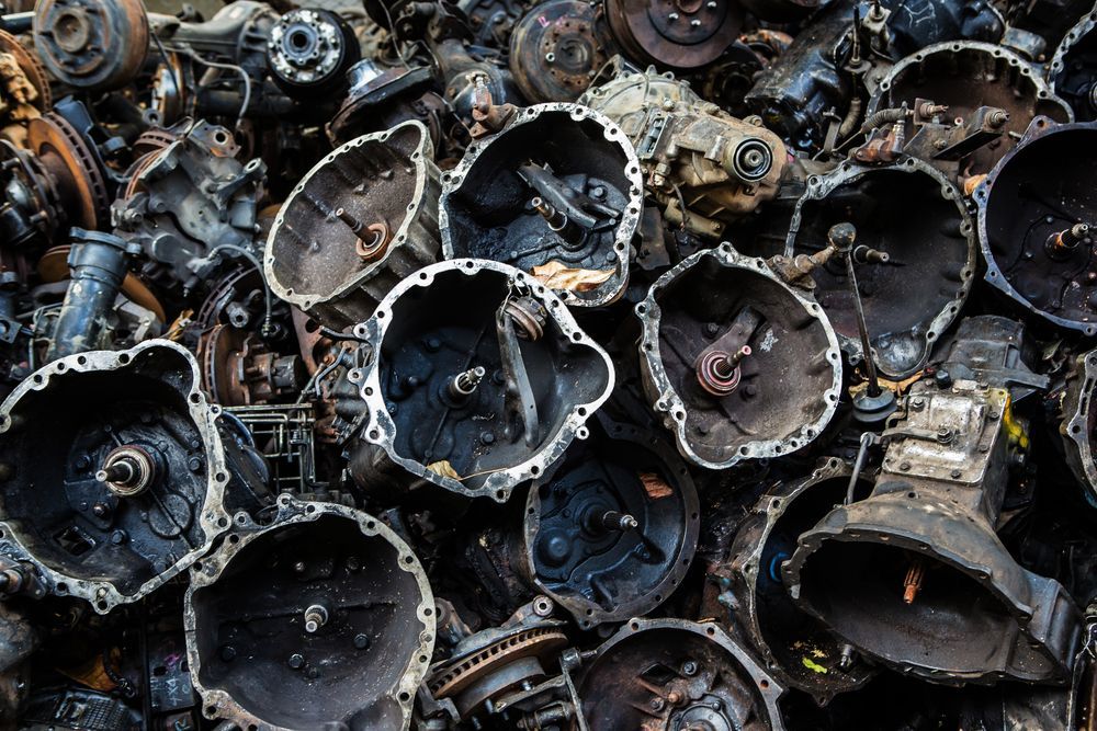 Pile of Used, Oily Automotive Transmission Parts — Independent Scrap Metal Pty Ltd in Mullumbimby, NSW