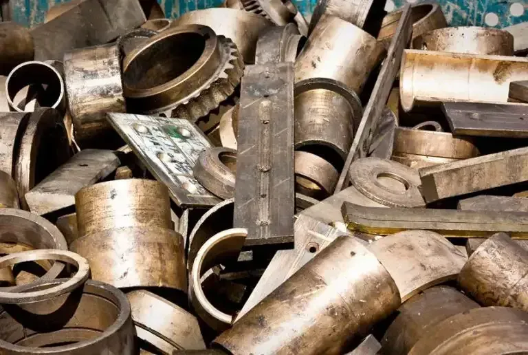 Pile of Scrap Metal With Various Bronze-coloured Shapes — Independent Scrap Metal Pty Ltd in Grafton, NSW