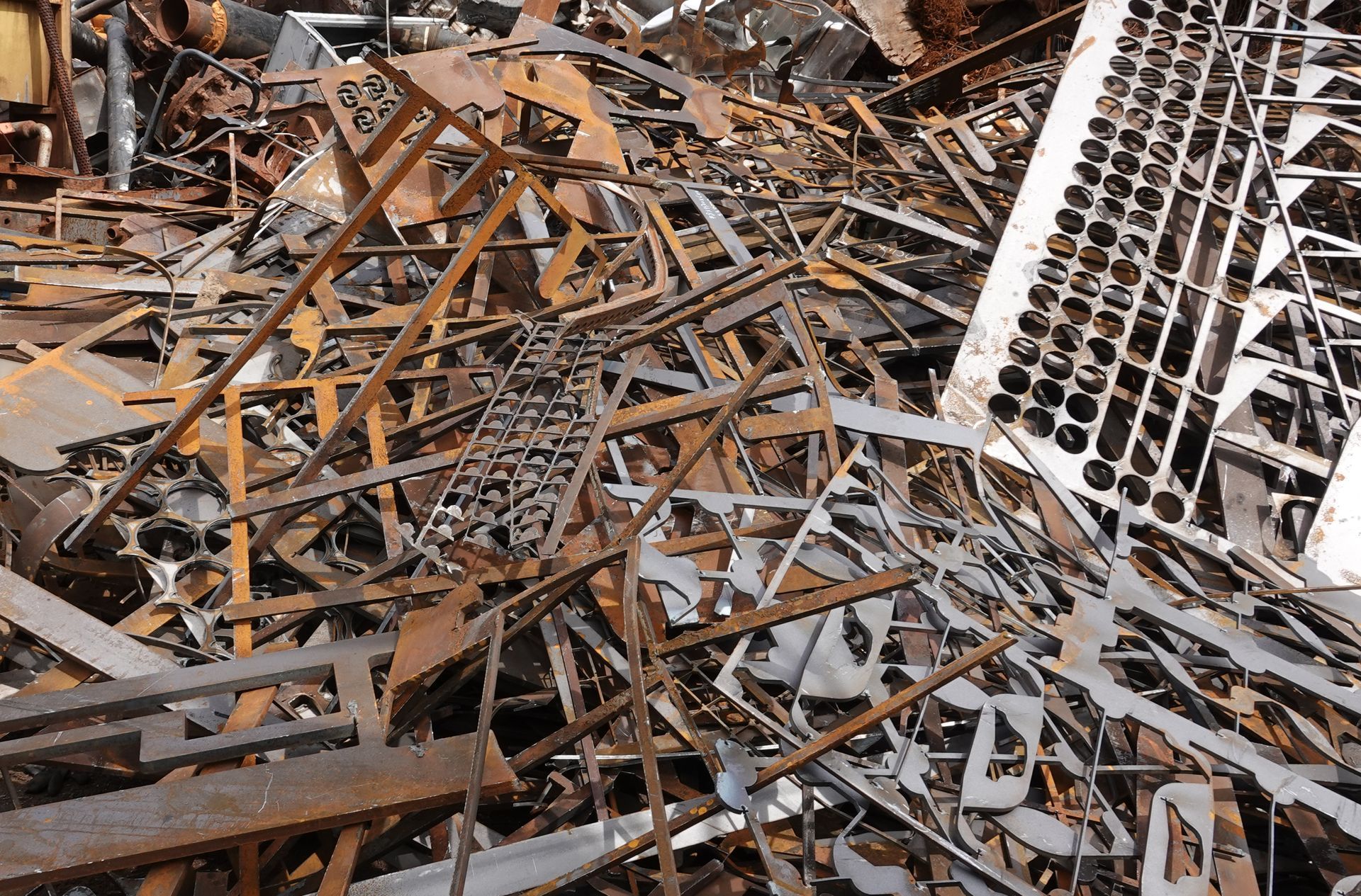 Pile of Scrap Metal, Including Cut-out Steel Shapes — Independent Scrap Metal Pty Ltd in Kyogle, NSW