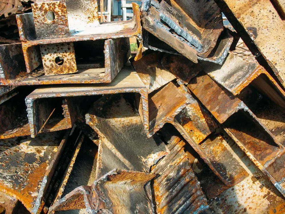 Pile of Rusty, Weathered Steel Beams and Angle Iron, Outdoors — Independent Scrap Metal Pty Ltd in Kyogle, NSW