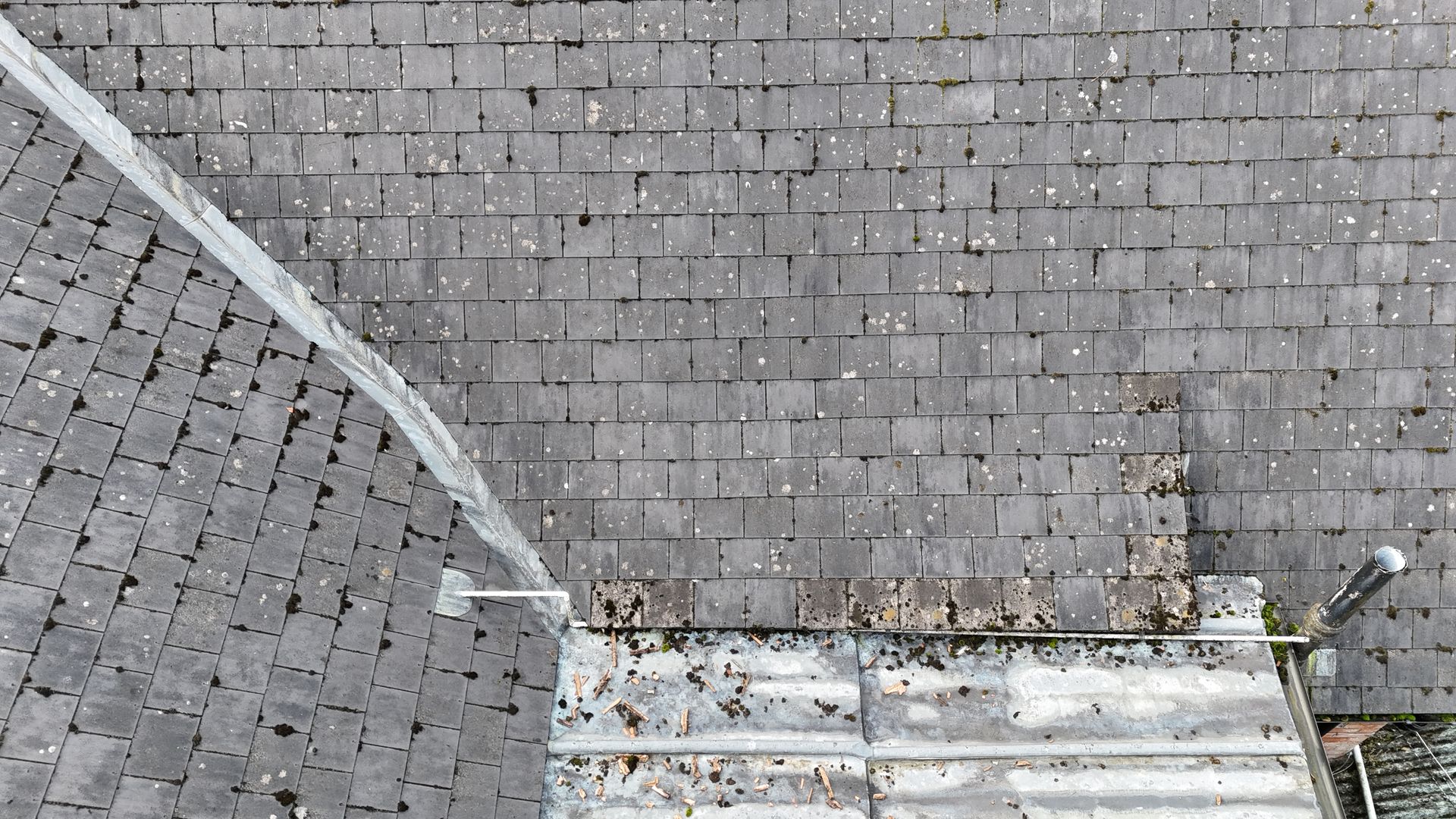 Drone roof survey showing slate tiles and leadwork.