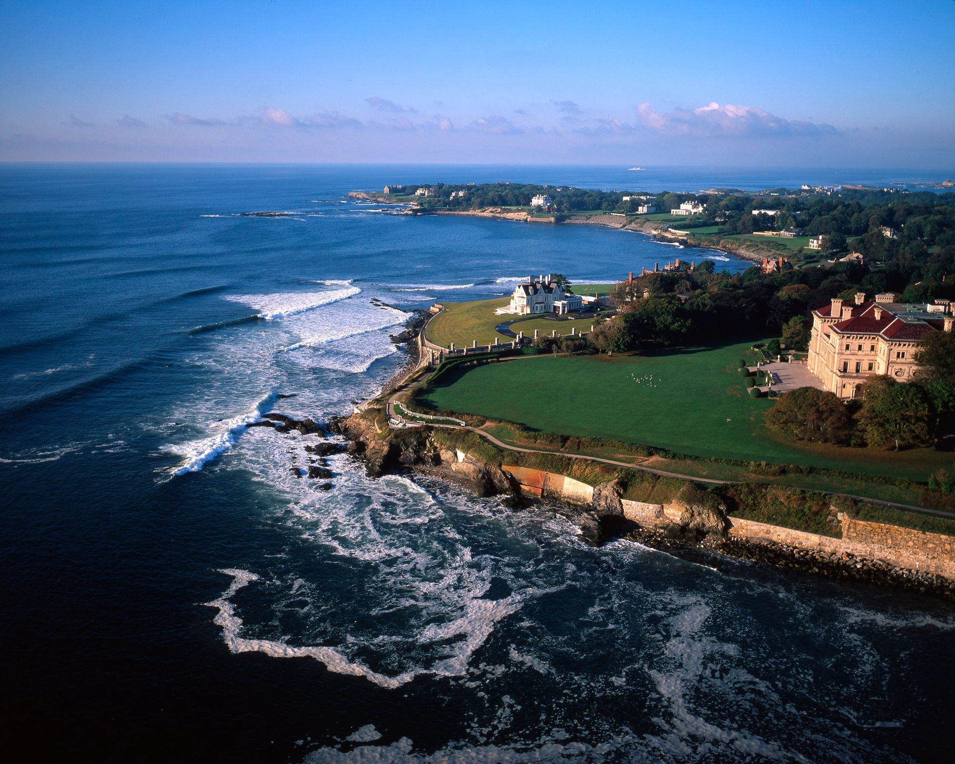 An aerial view of a cliff overlooking the ocean