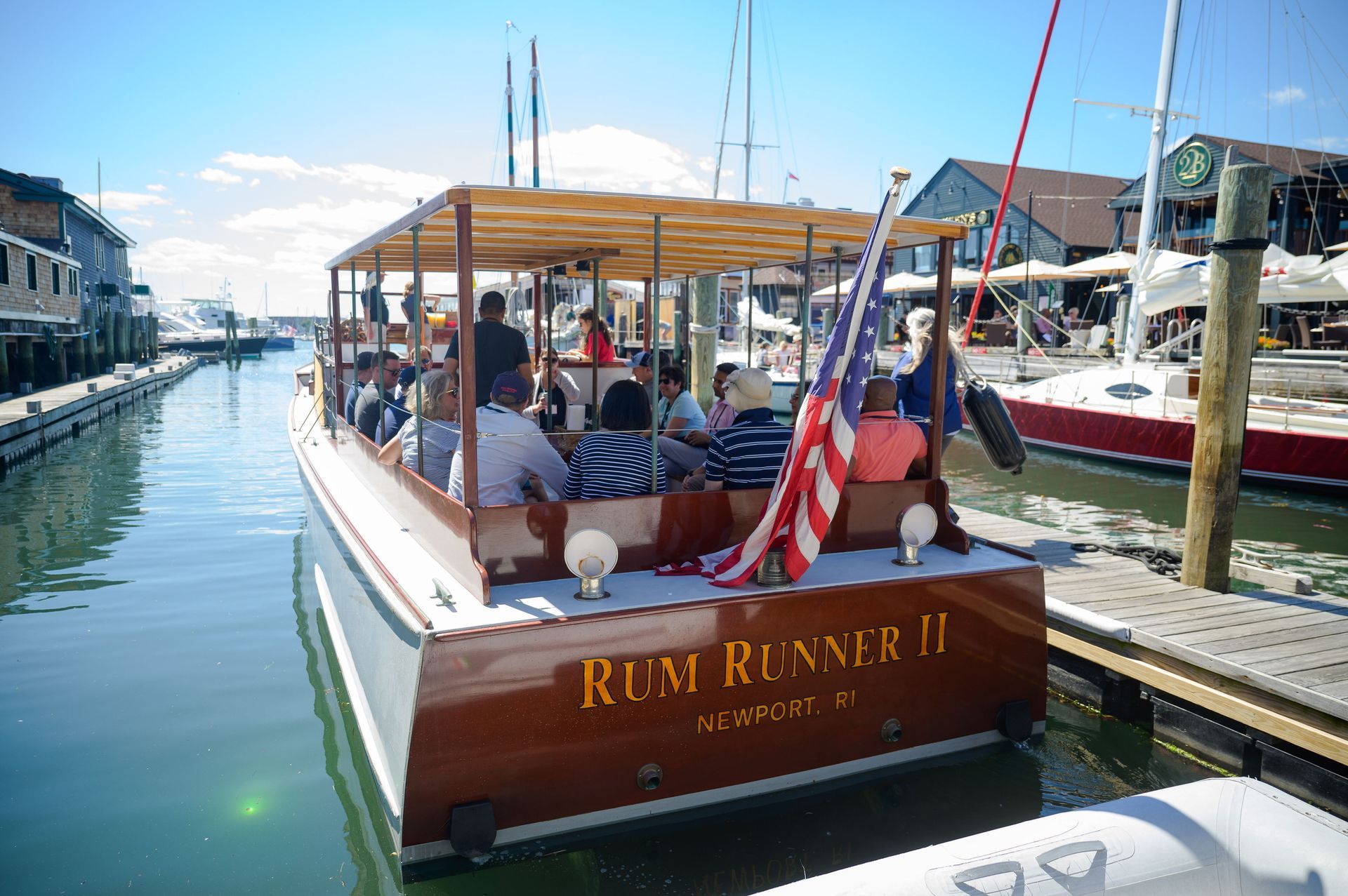 A wooden tour boat named 
