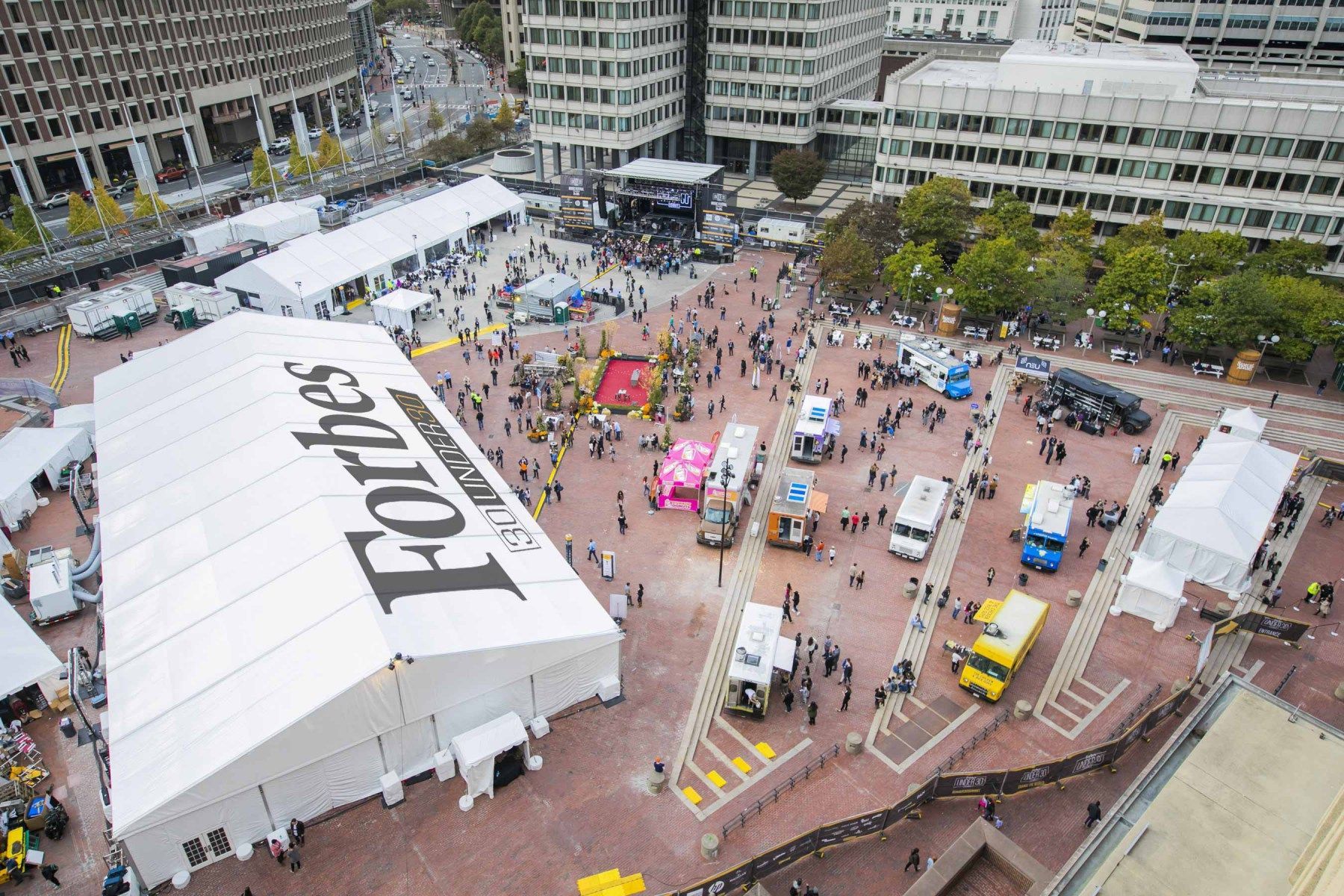 An aerial view of a forbes event in a city
