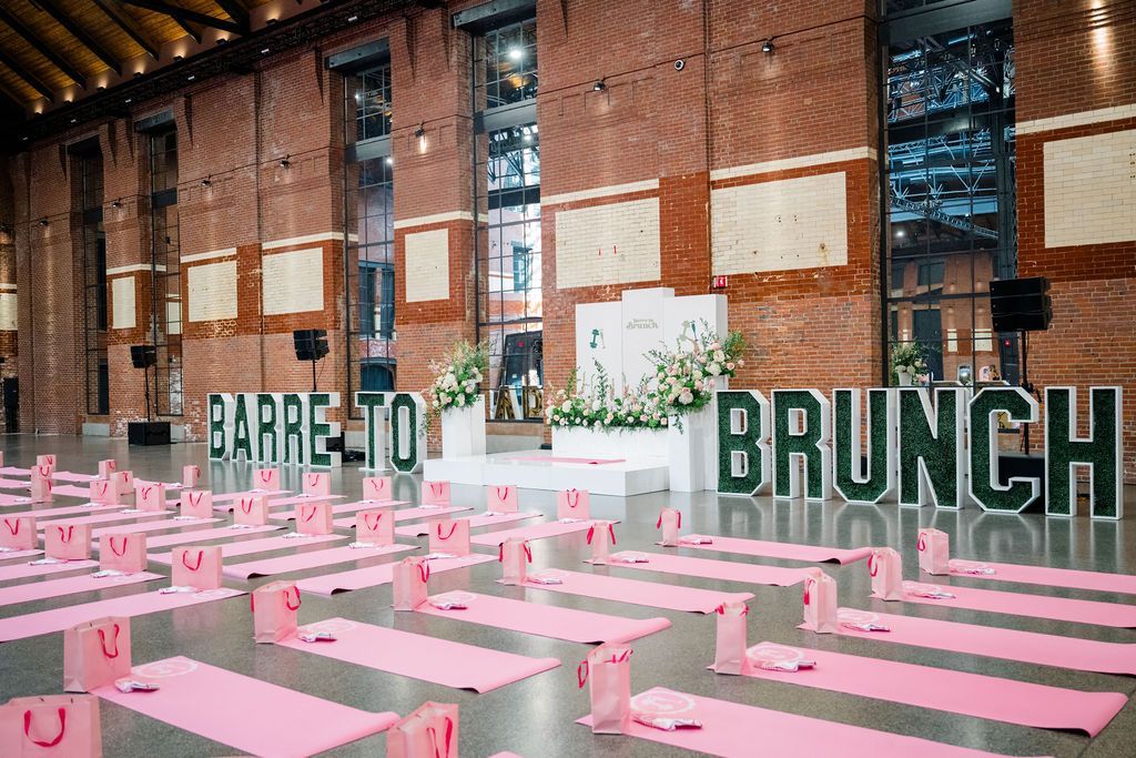 Pink yoga mats, gift bags, and 