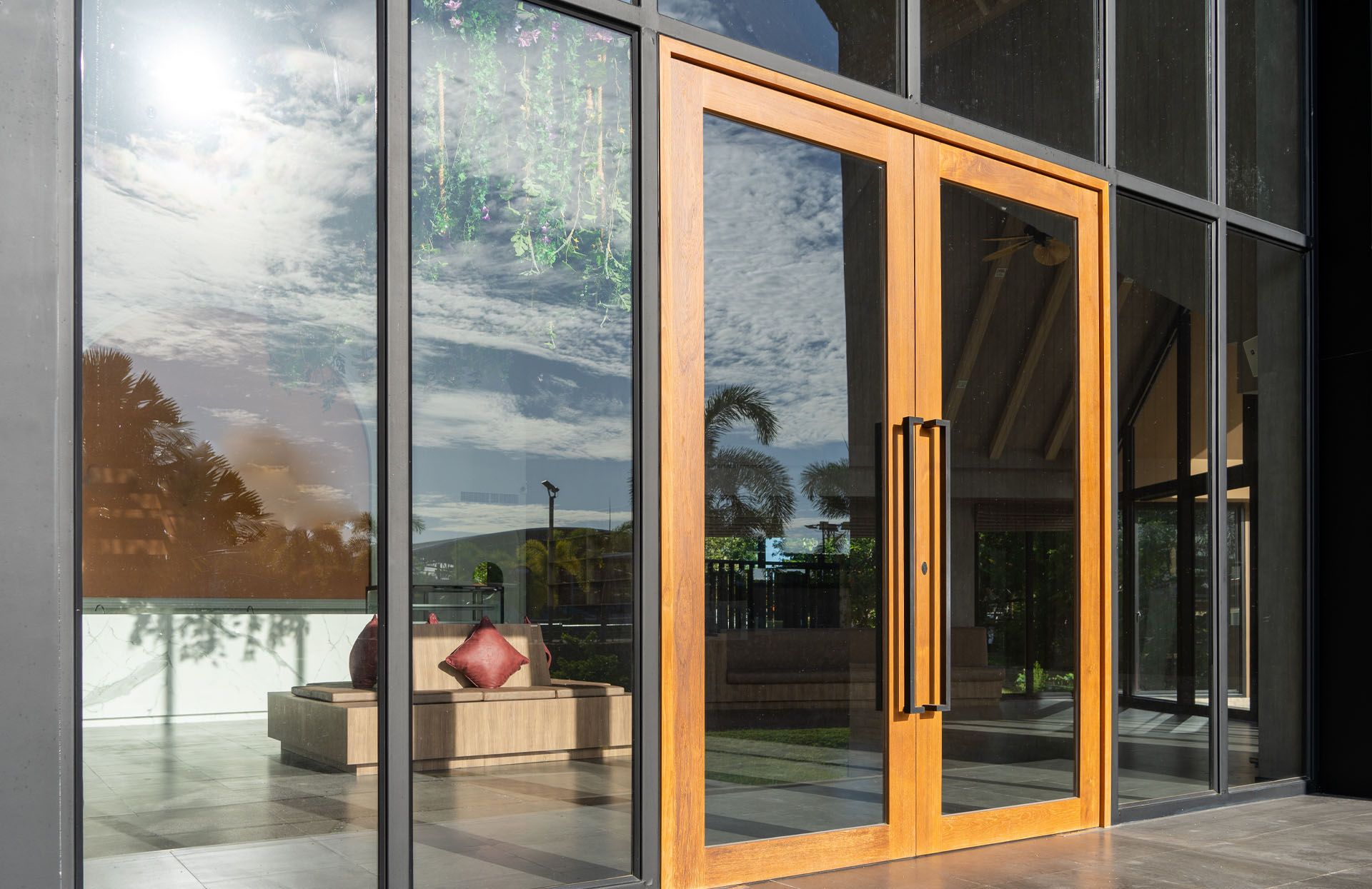 A building with a lot of windows and a wooden door.