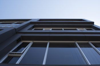 tall building with lots of glass windows