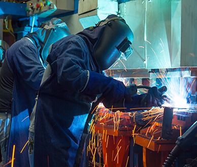 team of fabricators working together at the shop