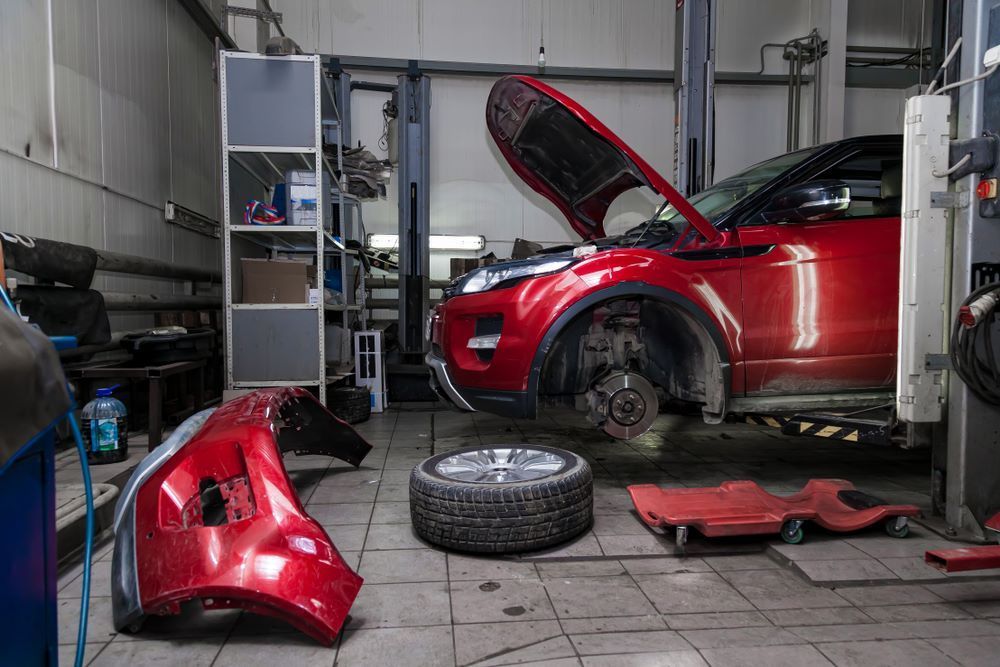 A Car Is Parked in A Garage — Mahers Smash Repairs in Armidale, NSW