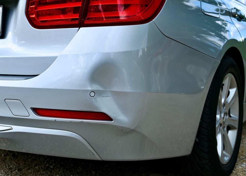 A Silver Car with A Damaged Bumper — Mahers Smash Repairs in Quirindi, NSW