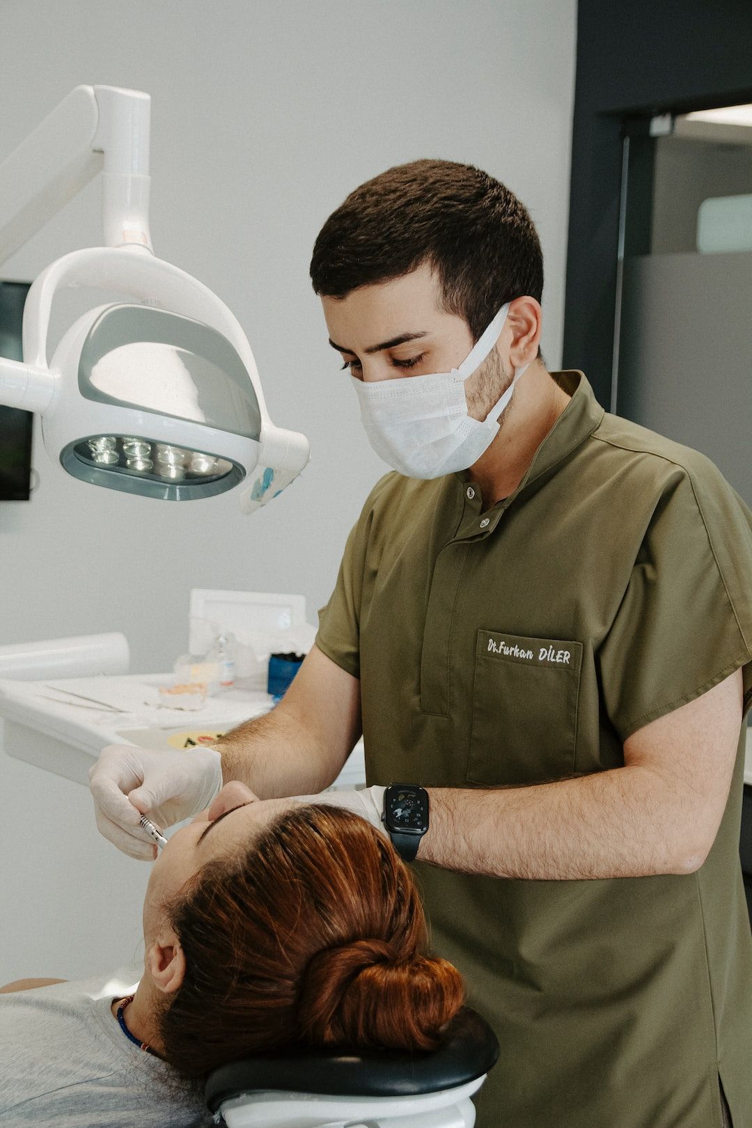 dentist working on patient's mouth