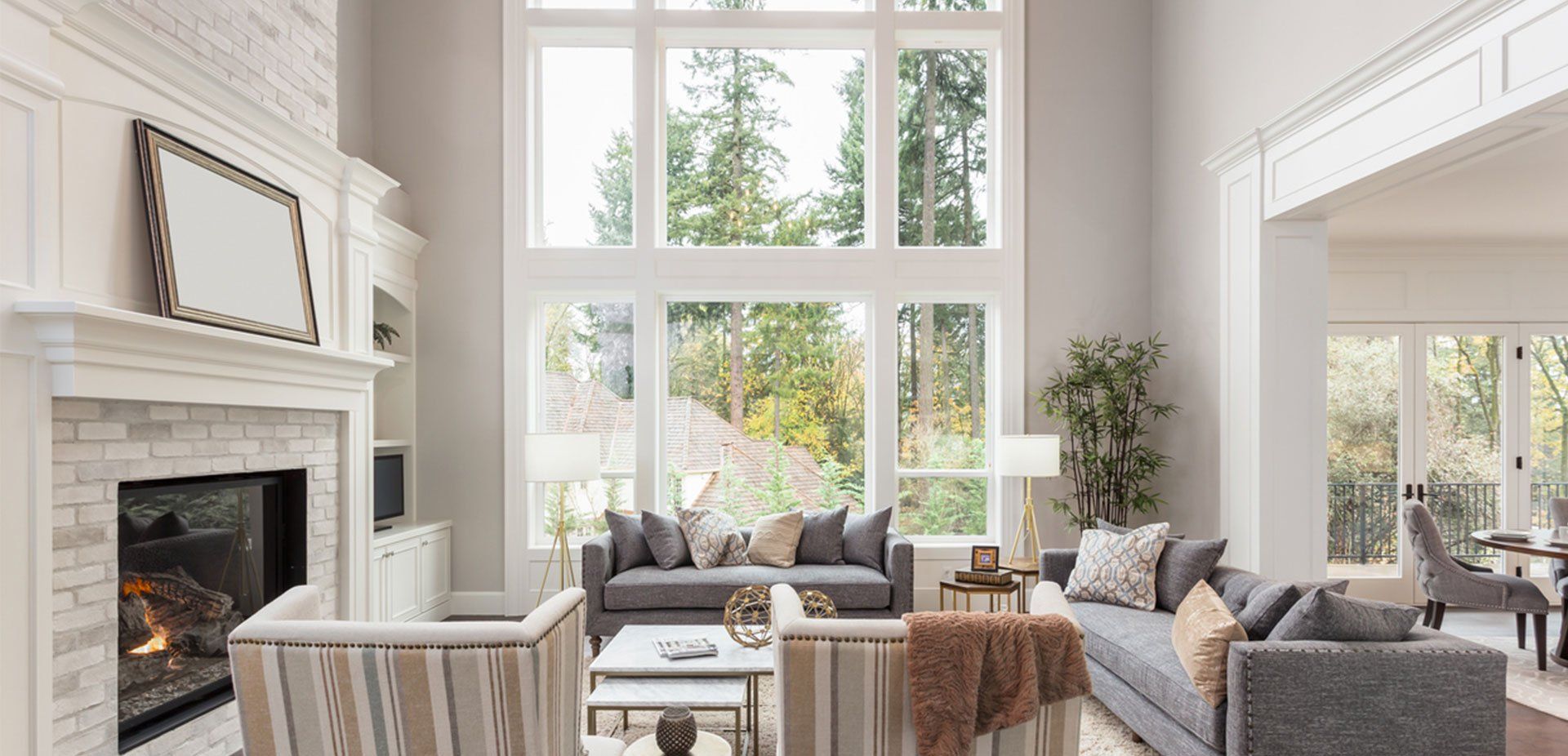 large energy-efficient replacement windows over stylish living room