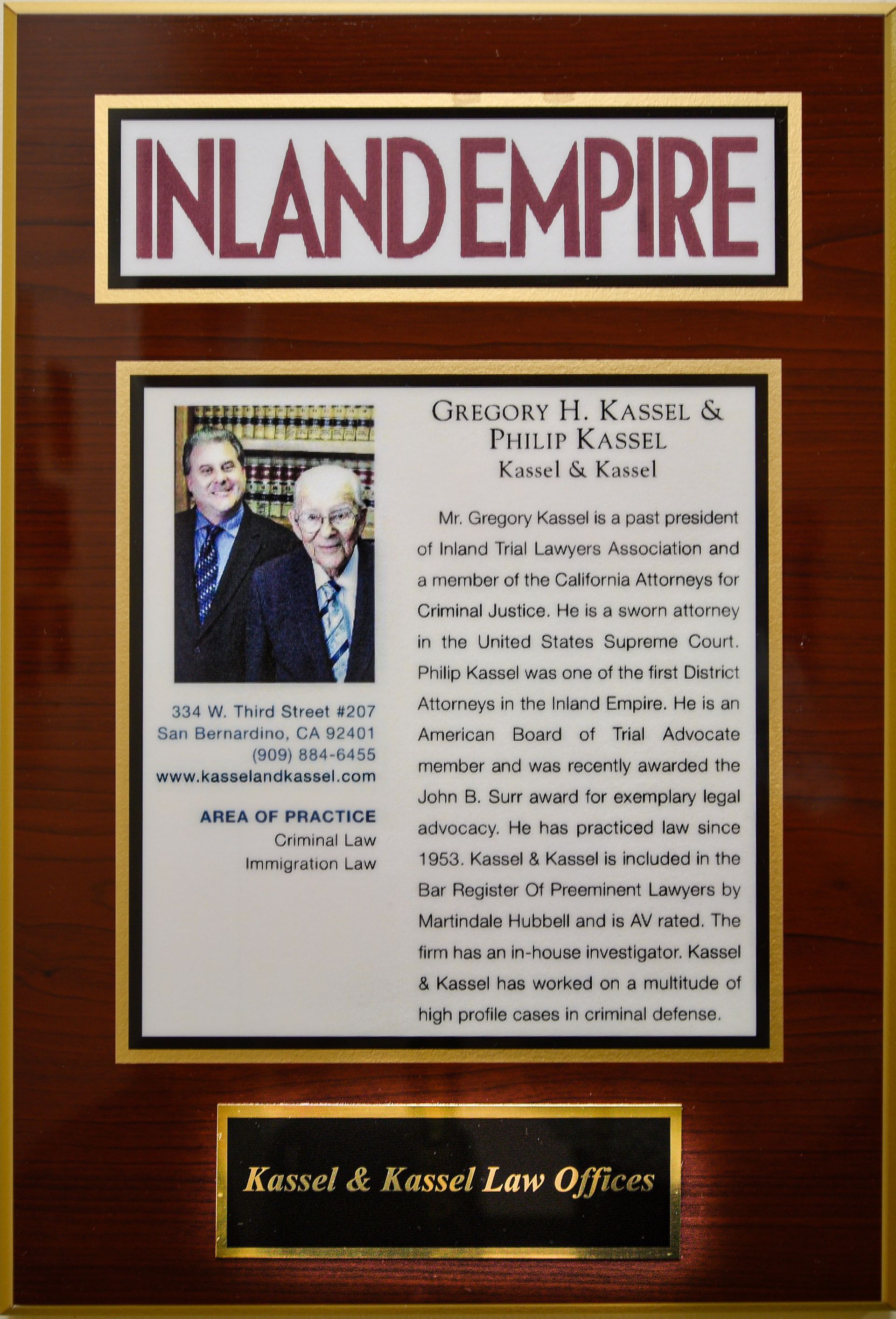 a framed plaque for gregory h. kassel and philip kassel