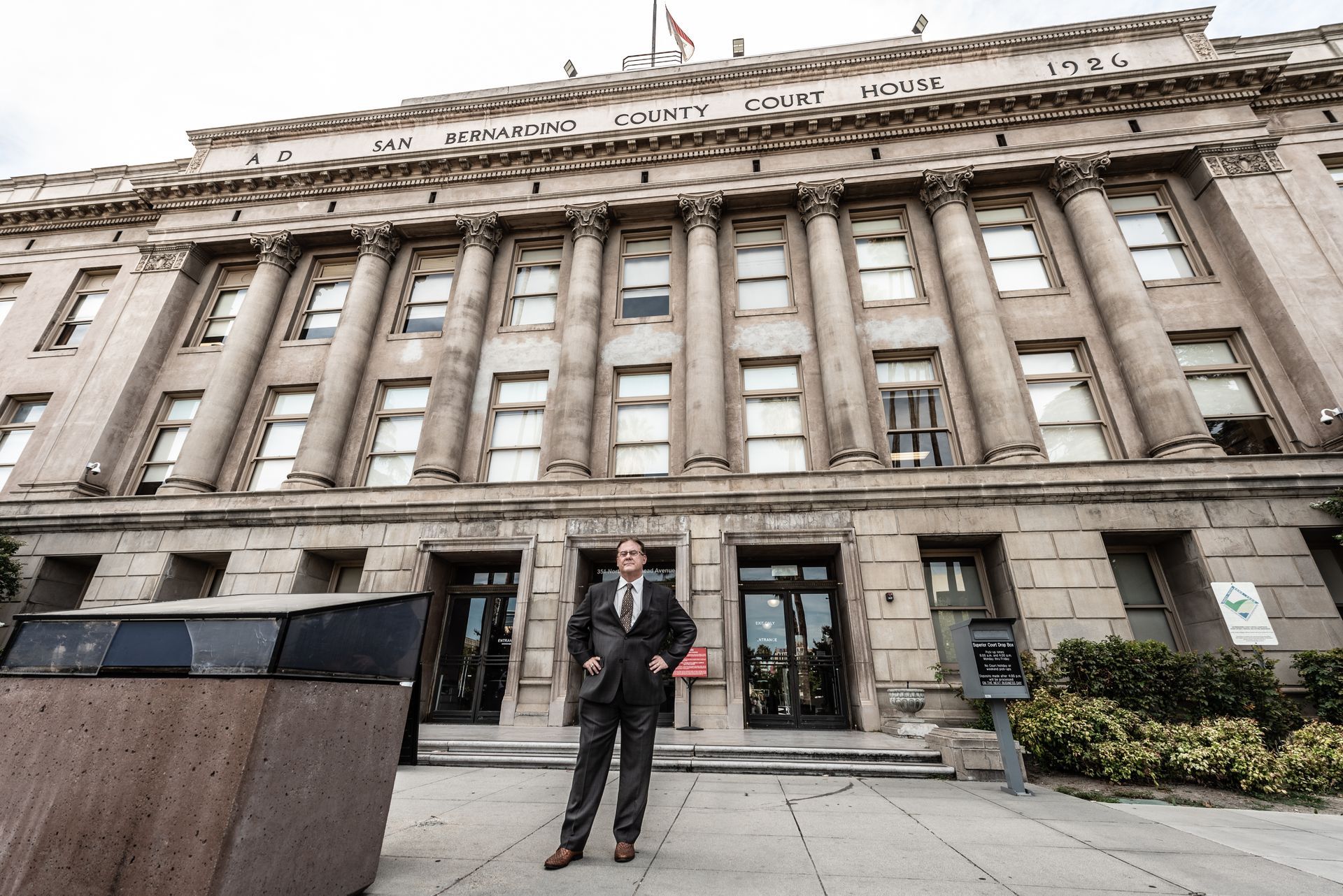 DUI Attorney Greg Kassel stands in front of the San Bernardino county court house