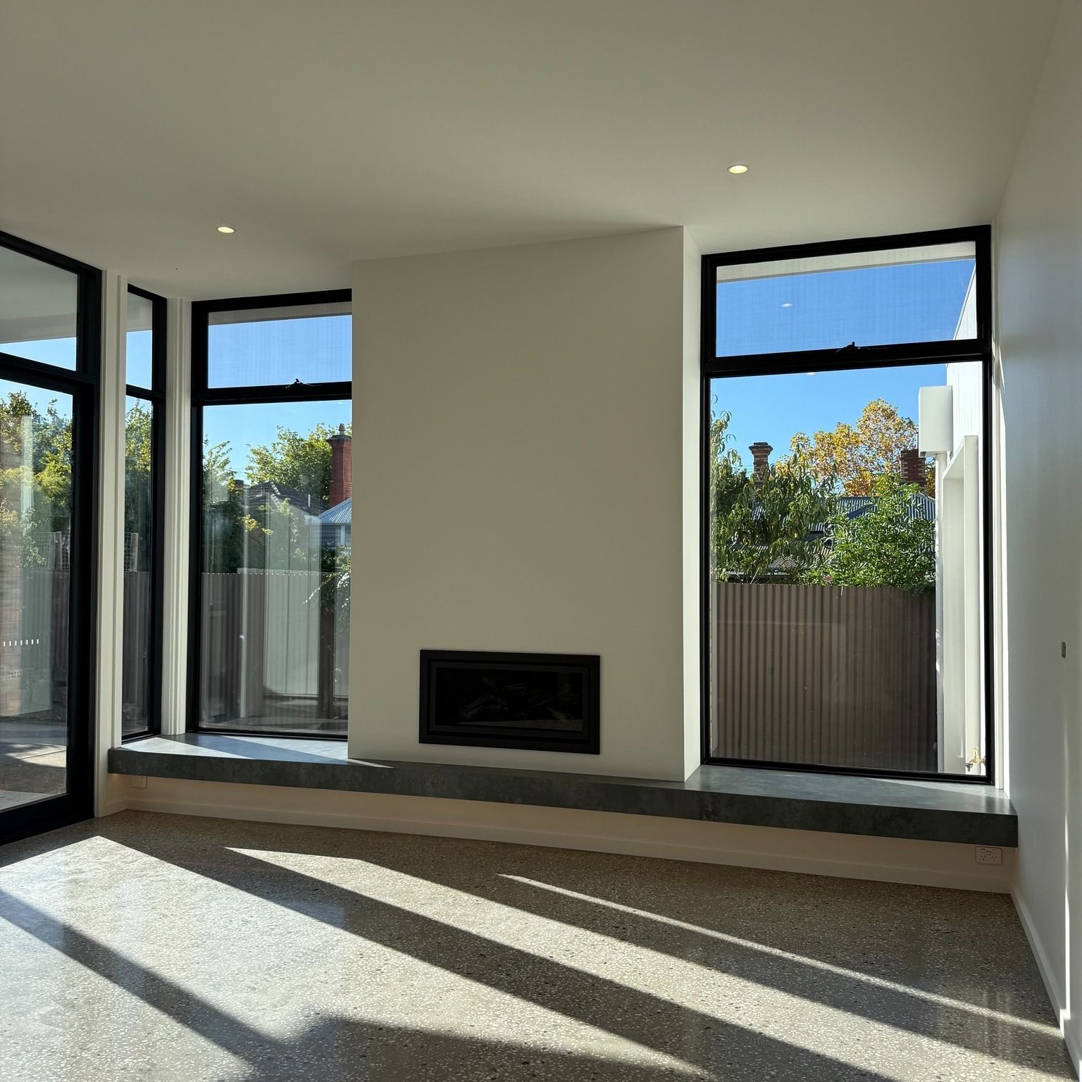 A Modern Living Room With Large Windows — Jetsonian Constructions In Wendouree,