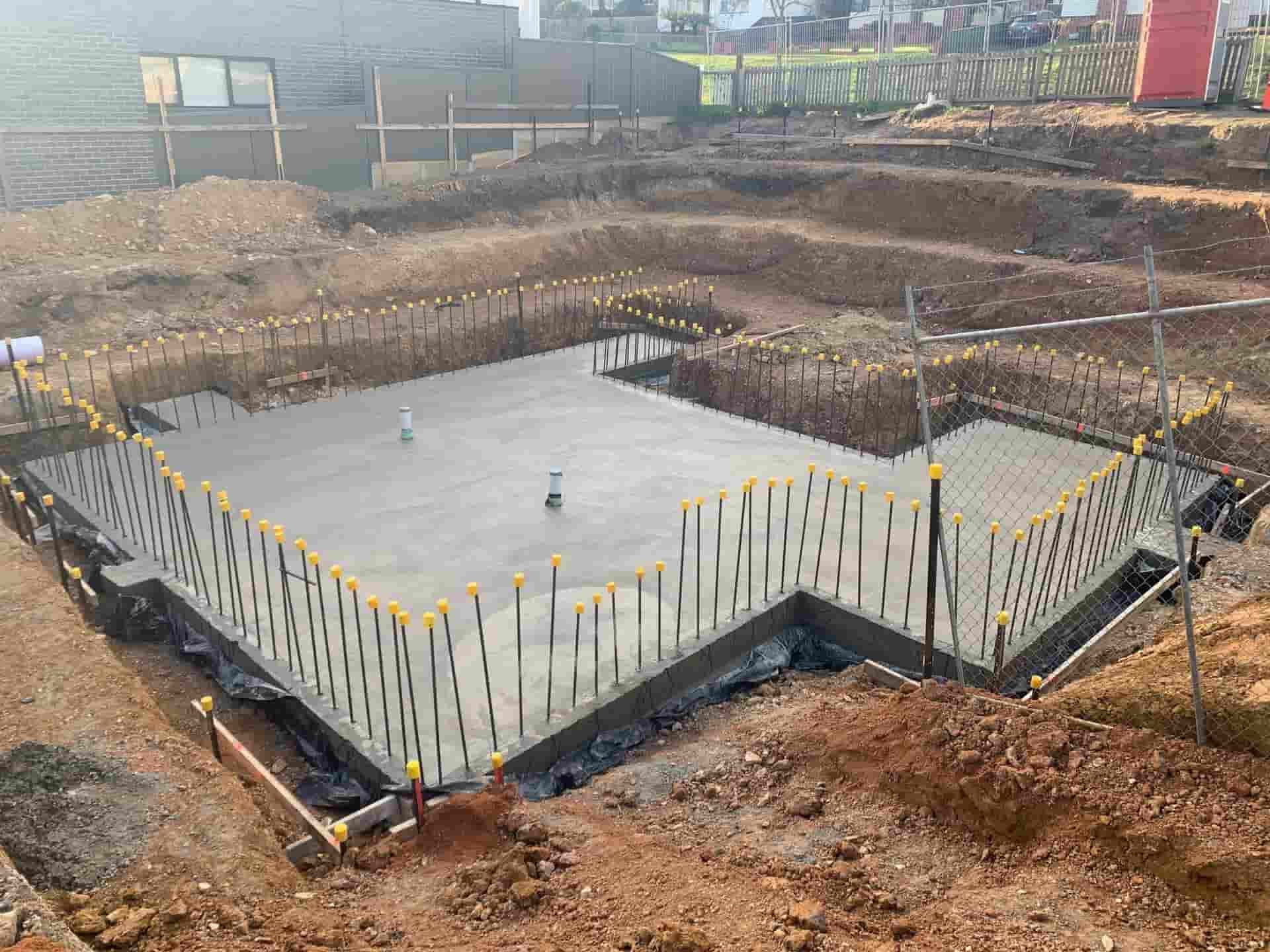A Large Concrete Foundation is Being Built on a Construction Site — Jetsonian Constructions In Wendouree, VIC