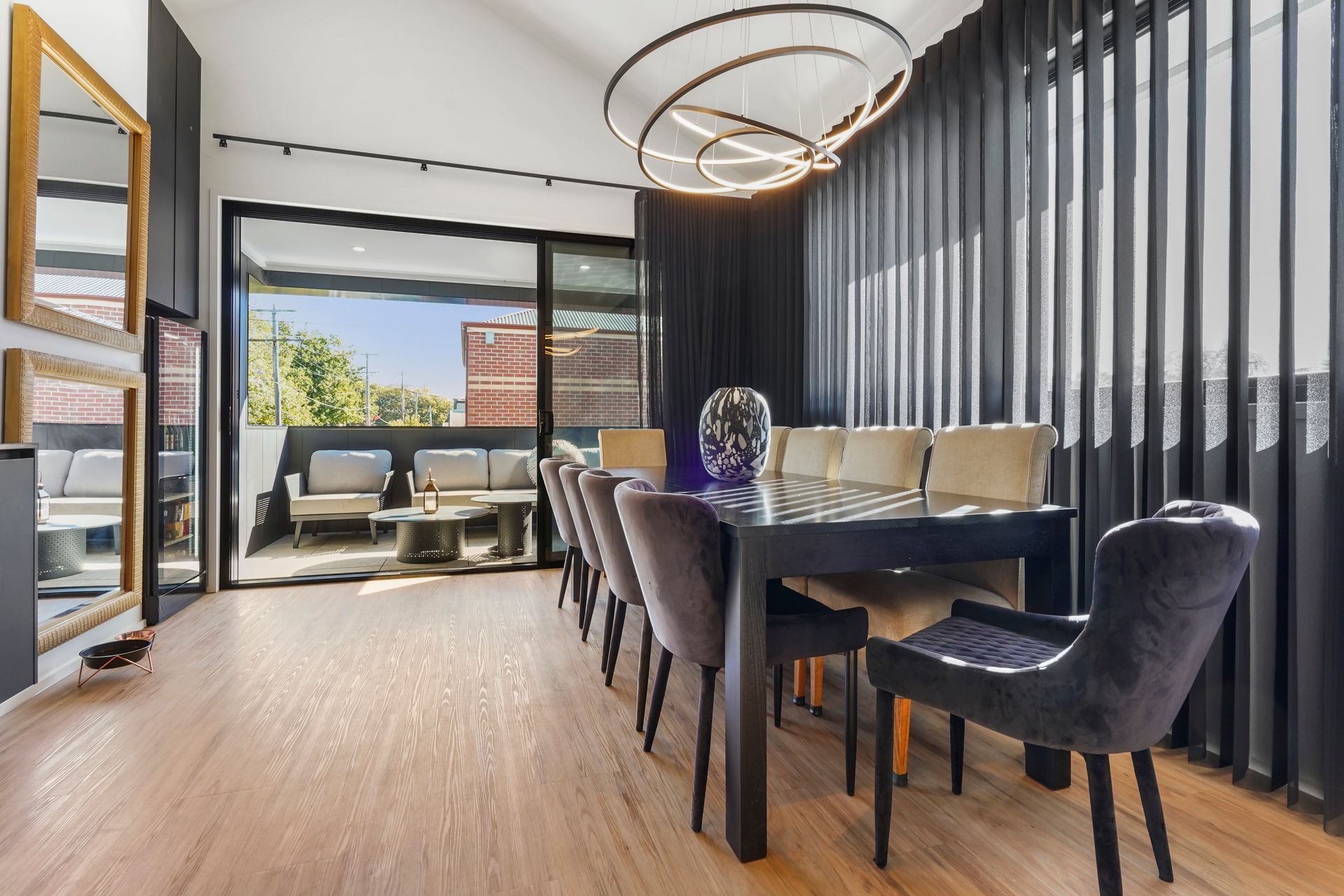 Dining Room with Black Table, Chairs, and Curtains — Jetsonian Constructions In Wendouree, VIC