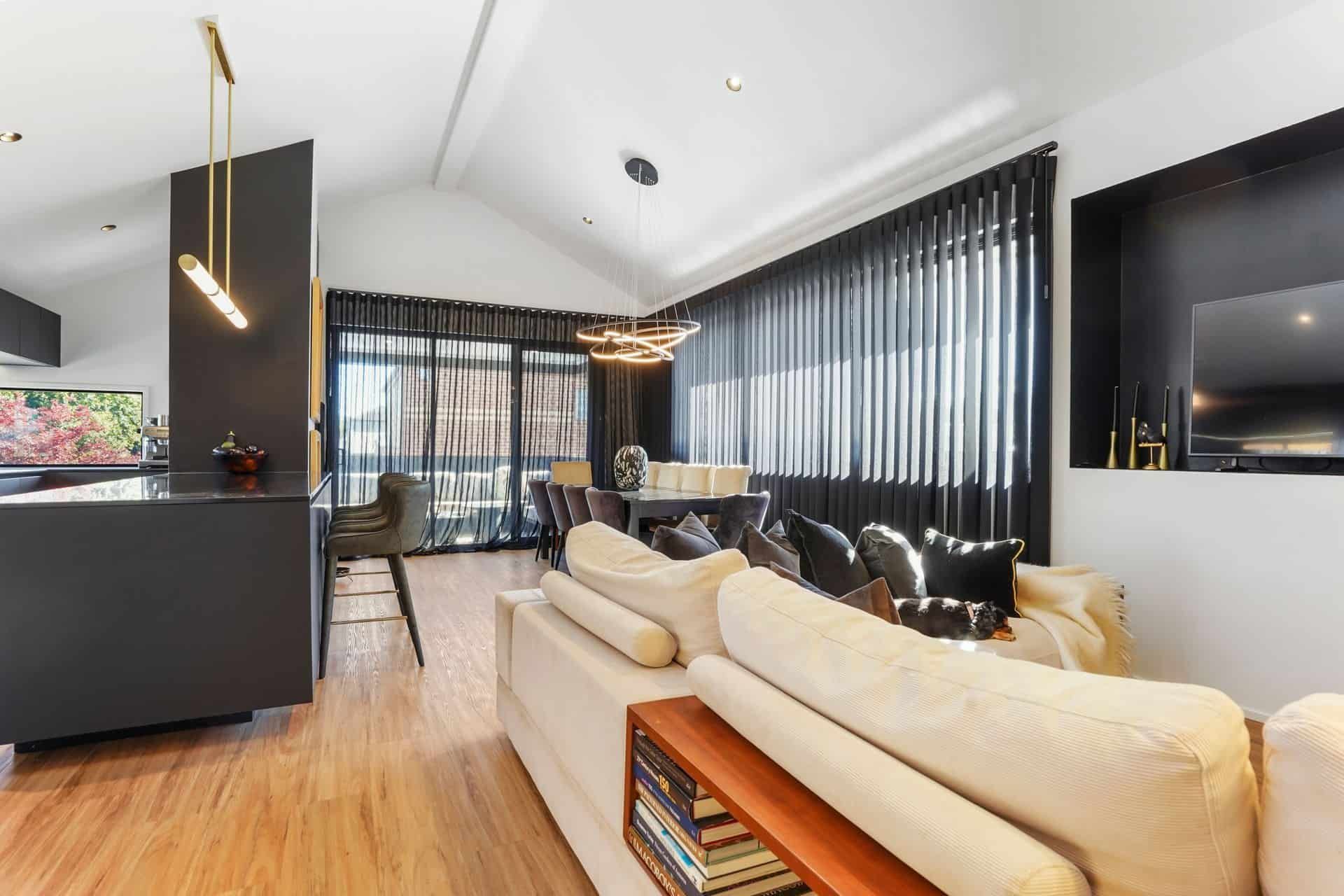 A Living Room With a Couch, Table, and Television — Jetsonian Constructions In Wendouree, VIC