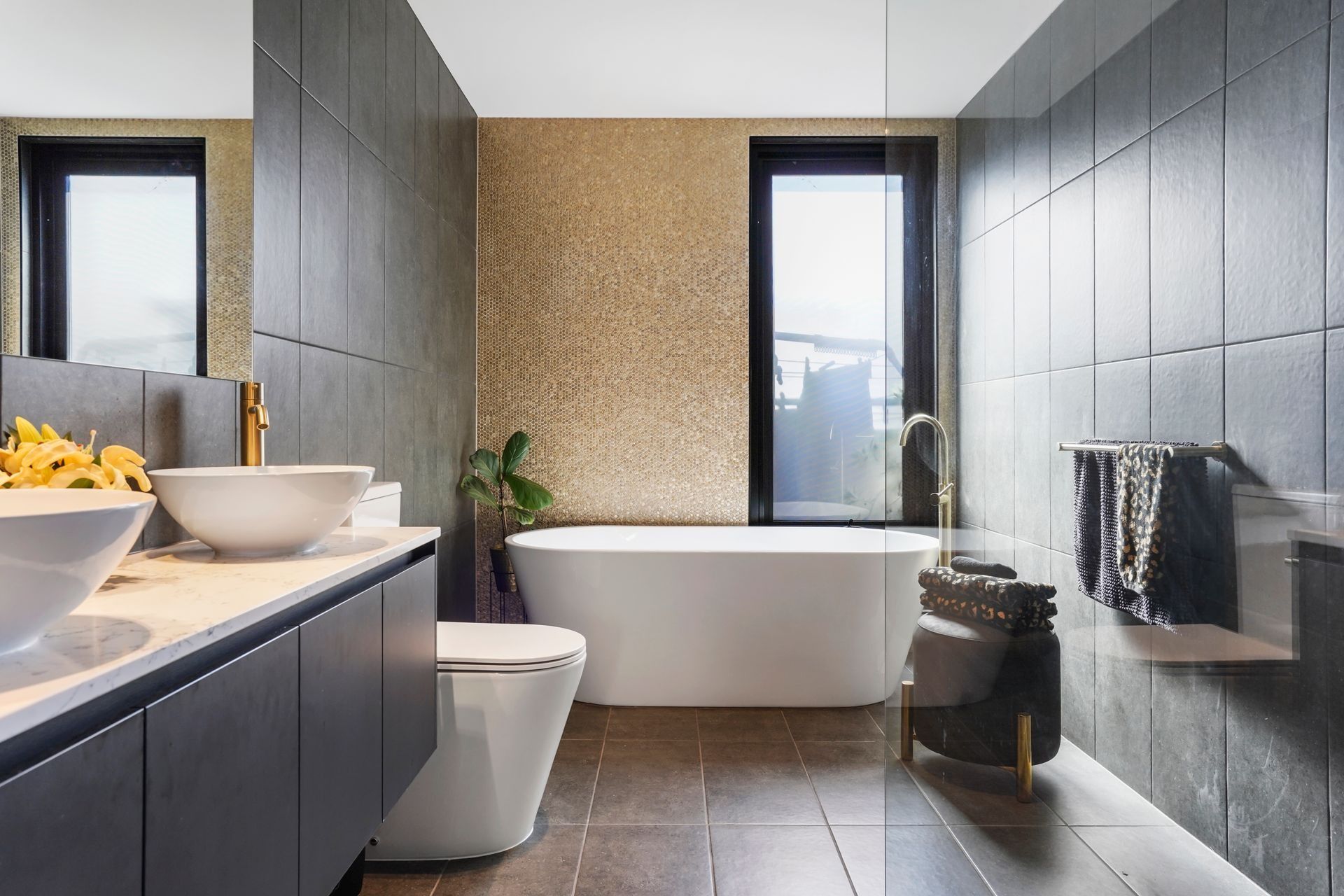 A Bathroom With a Tub, Toilet, Sink and Mirror — Jetsonian Constructions In Wendouree, VIC