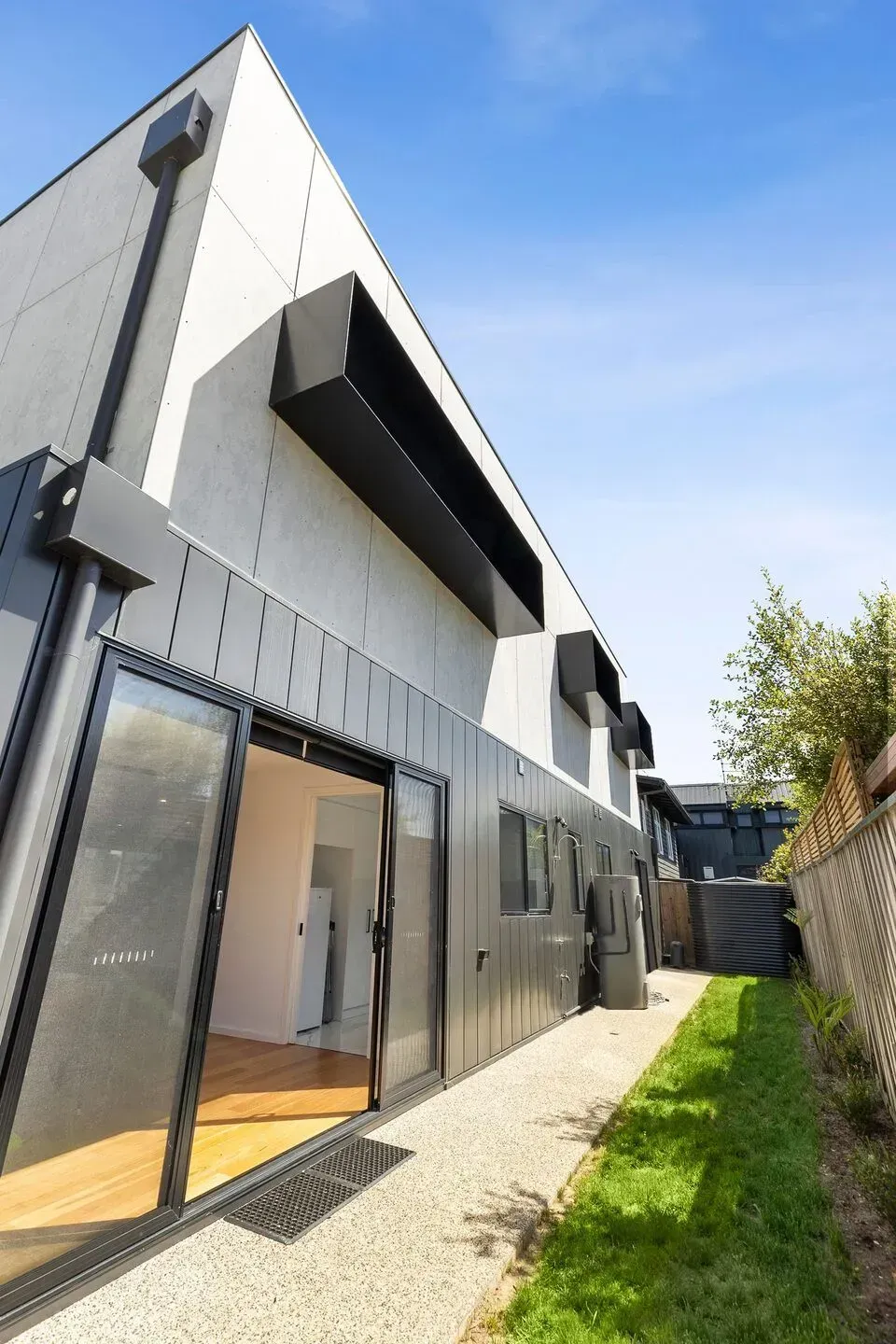 A House With A Lot Of Windows And Sliding Glass Doors — Jetsonian Constructions In Wendouree, VIC