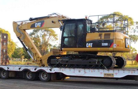 Excavator Truck Parked On The Road — A & B Mullins Excavations Pty Ltd in Bundaberg in Bundaberg , QLD