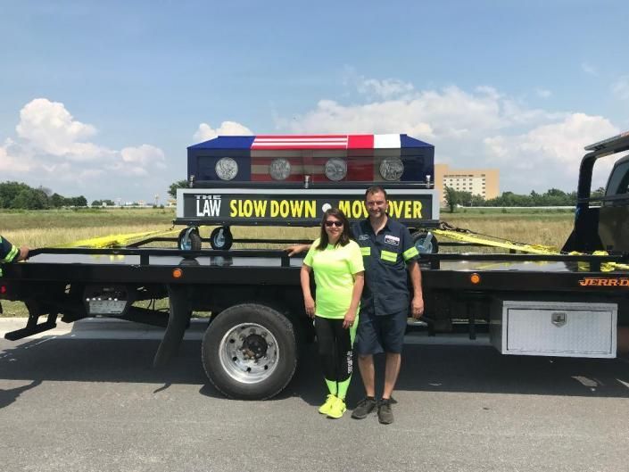 alma auto service owners with tow truck