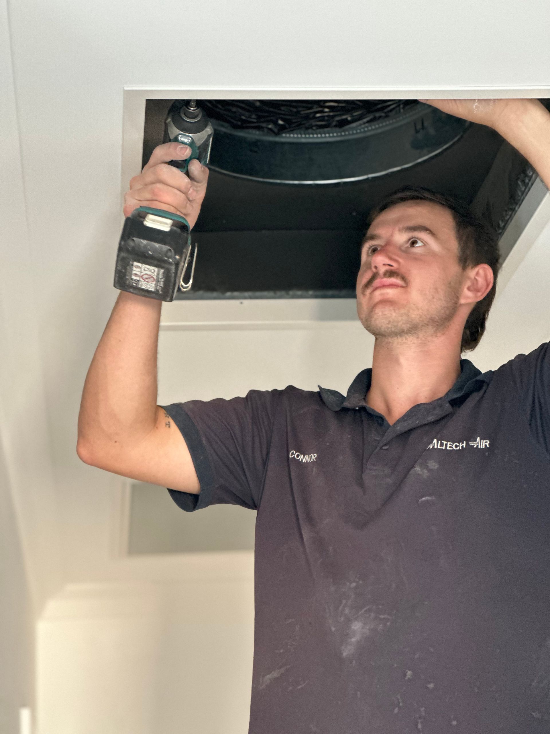 Technician Checking the Air Conditioning Unit | Bathurst, NSW | Altech Air