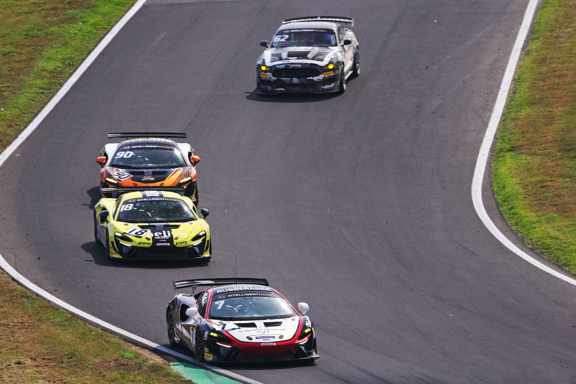 The Artura GT4 leads a pack of cars at Brands Hatch