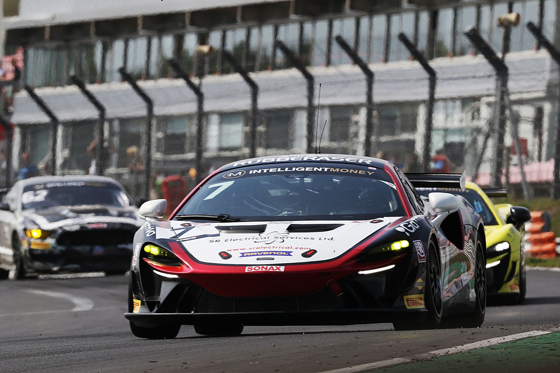 Paddock's Artura GT4 entering Paddock Hill Bend