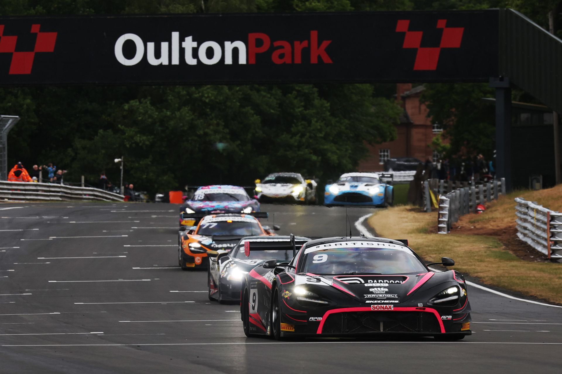 Paddock's McLaren leading a pack at Oulton Park