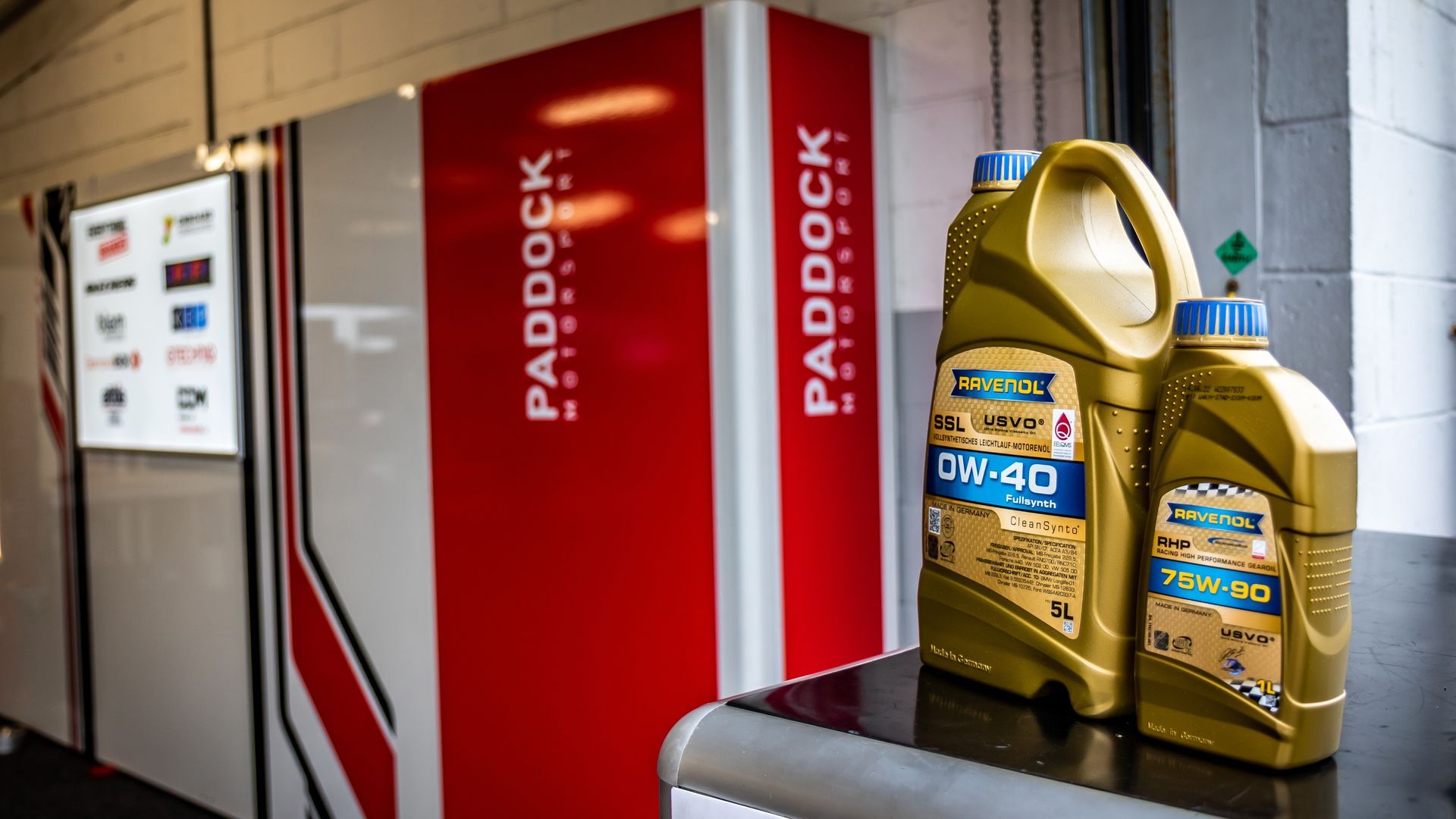 A selection of Ravenol products in the Paddock Motorsport garage