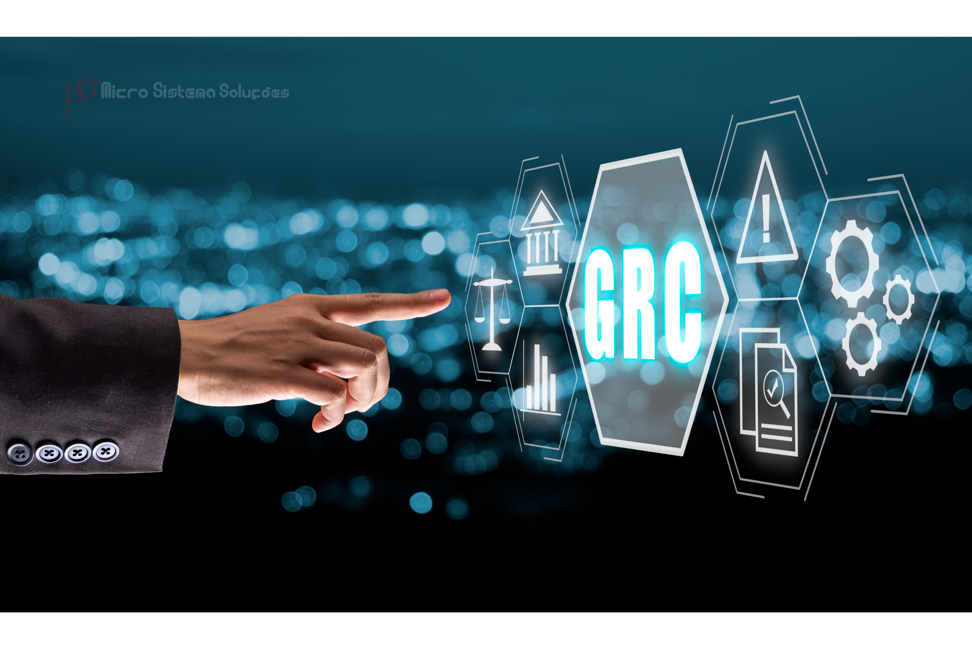 A hand is pointing at a screen that says grc.