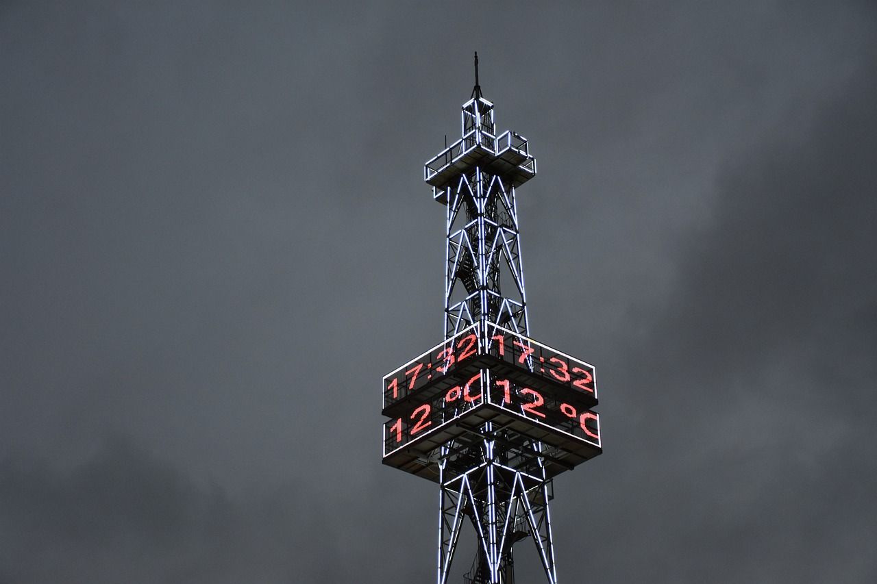 A clock tower shows the time as 17:32