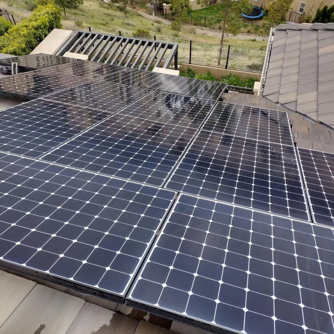 A roof with a lot of solar panels on it