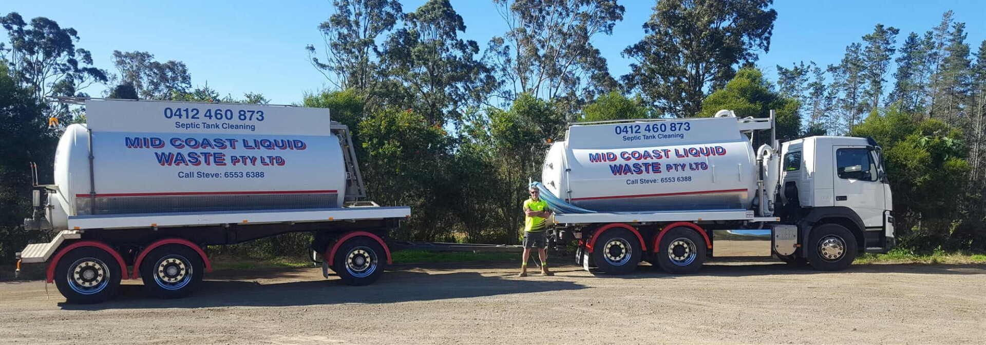 Two Tanker Trucks Are Parked Next to Each Other in a Parking Lot — Mid Coast Liquid Waste In Forster, NSW