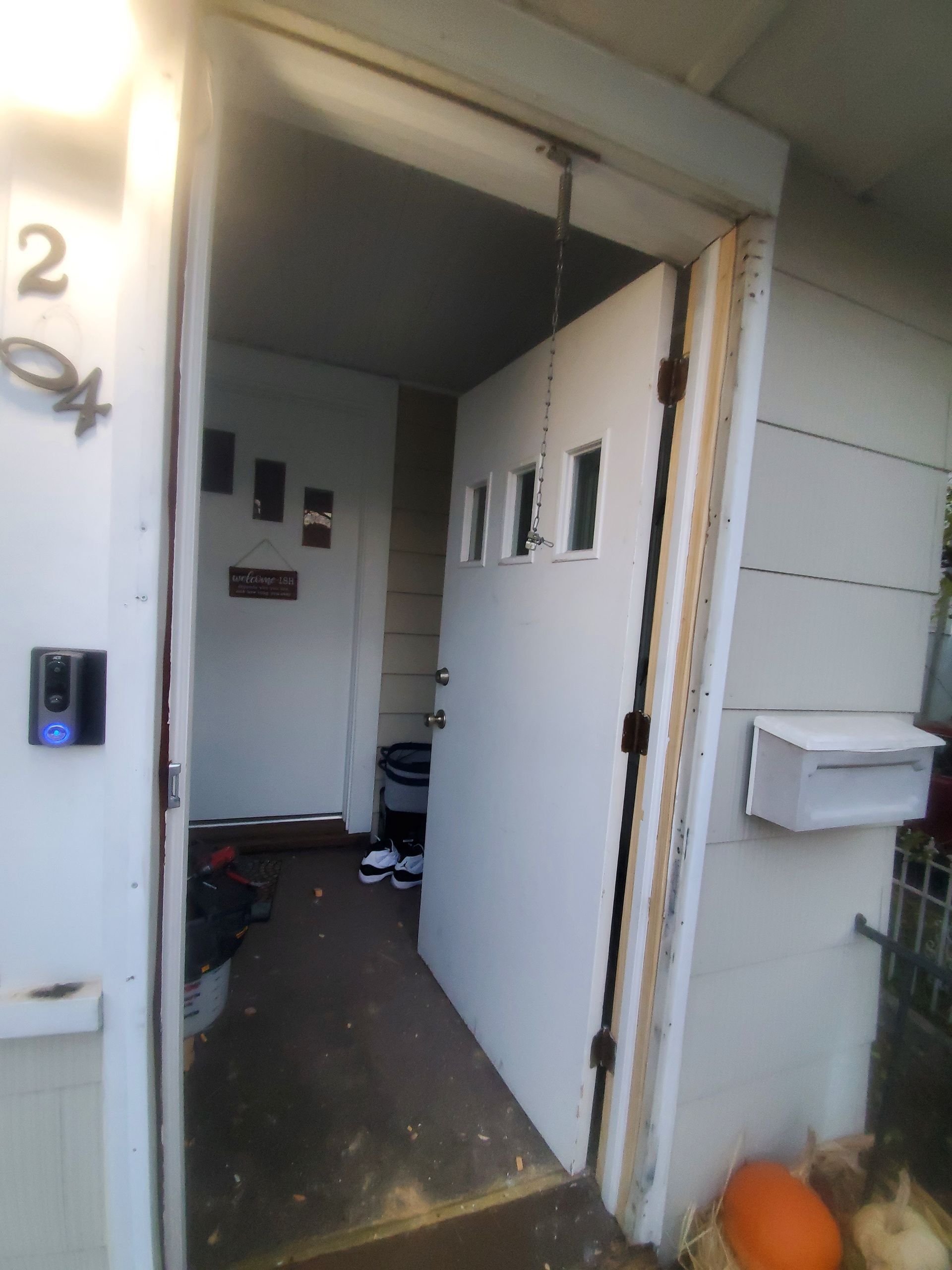 A white door with the number 24 on it