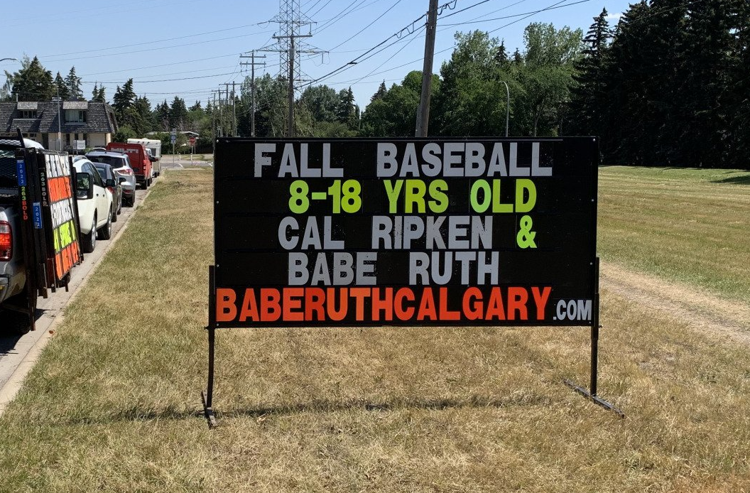 A sign that says fall baseball 8 18 yrs old cal ripken babe ruth baberuthcalgary.com