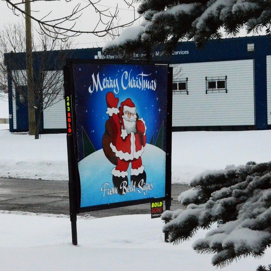 A sign that says merry christmas on it